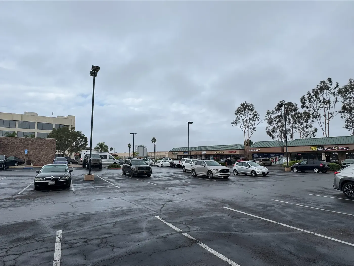 Miramar Plaza parking lot and storefronts
